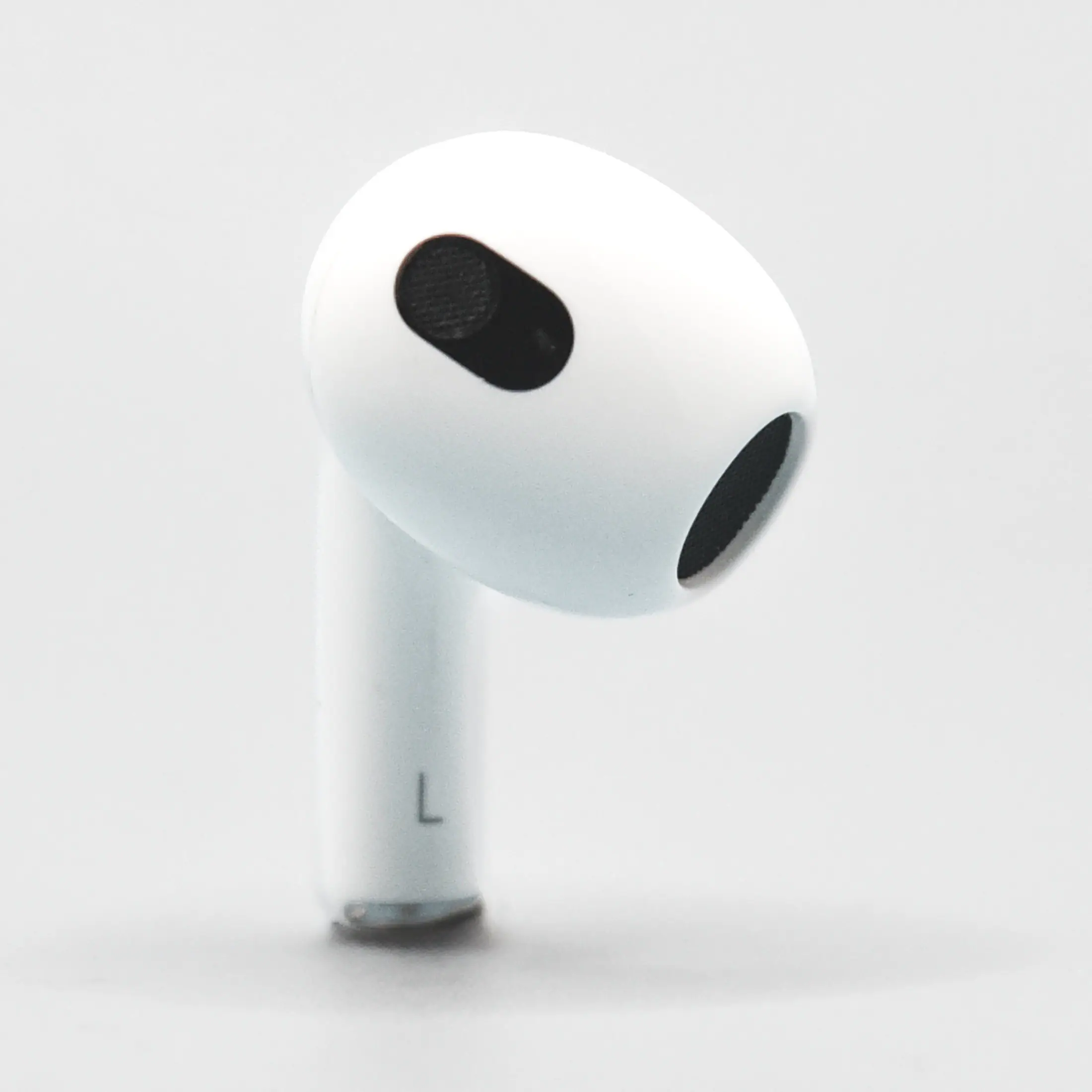 Front. Apple - Apple Left Replacement AirPod - 3rd Generation (A2564) - White.